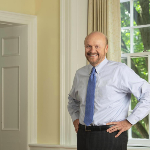 Chancellor Christopher J. Molloy standing in front of window