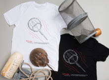 Picture of one black and one white T-shirt with a horshoe crab image. Surrounded by a net and a horshoe crab.